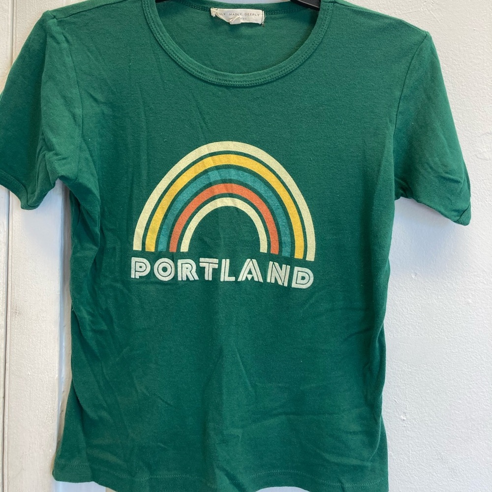 Green graphic tee.